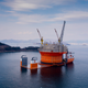 Illustration for article titled Here's The Largest Oil Rig Ever On Top Of The Largest Transport Ship